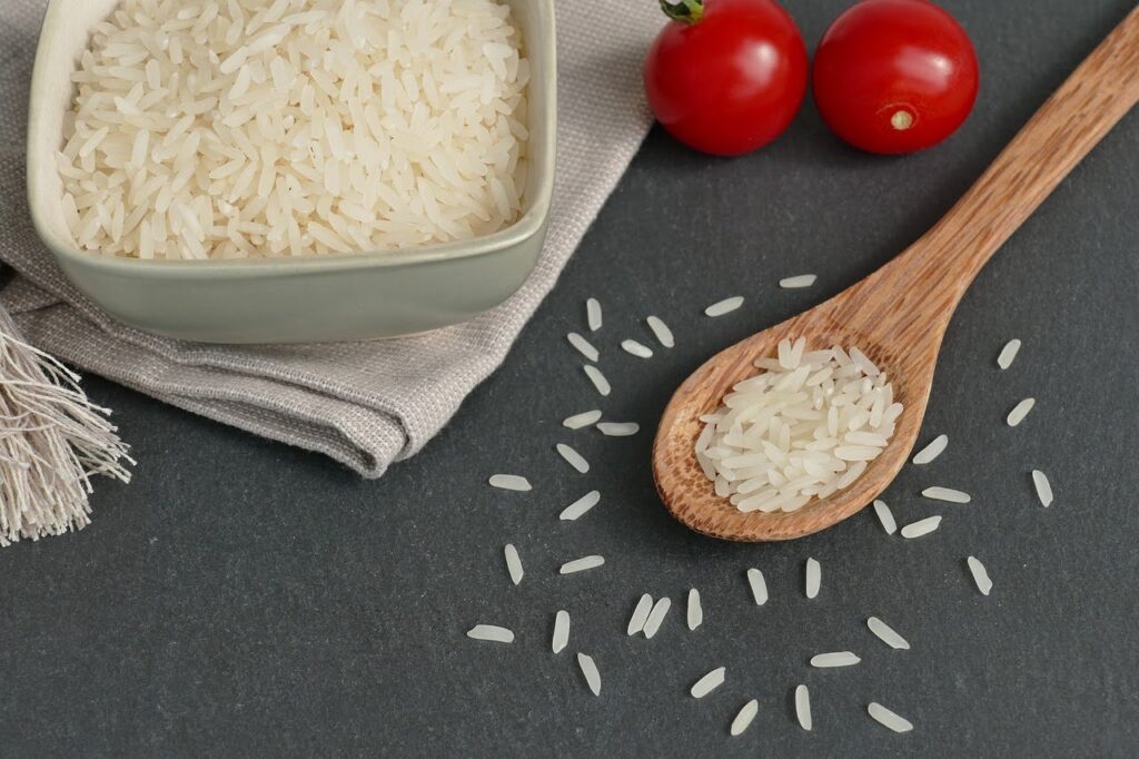 White rice in a bowl on a spoon